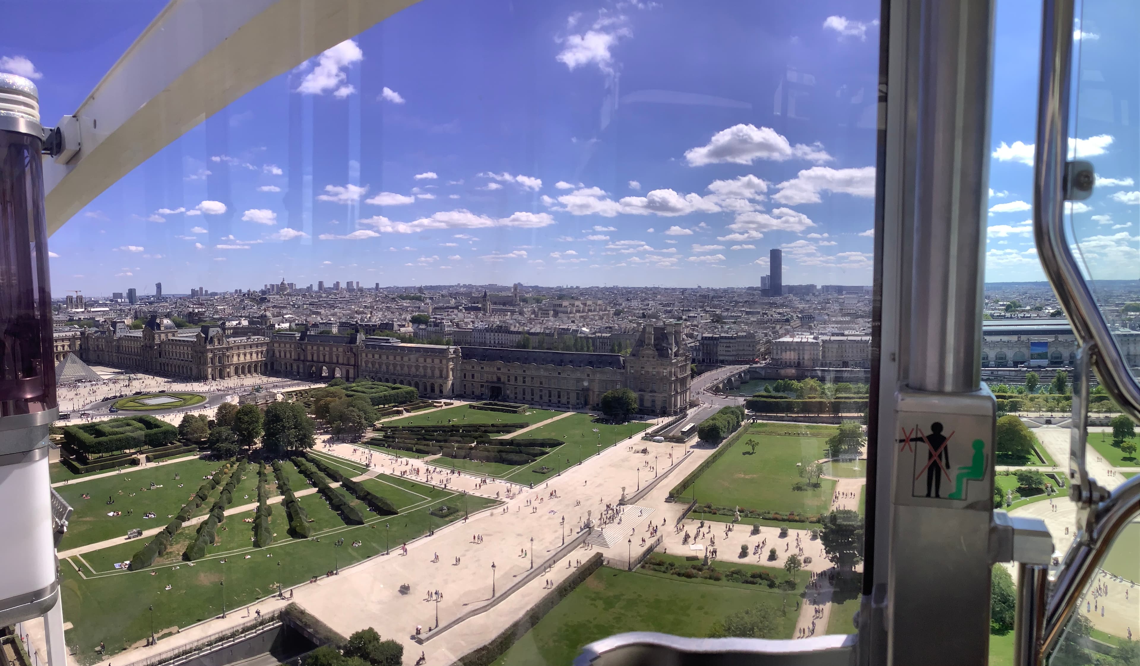 Panoramic view of central Paris rooftops from the Tuileries Ferris wheel